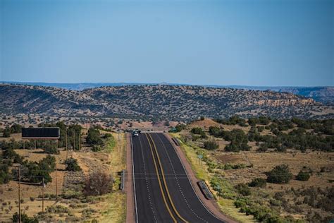 Premium Photo | Natural american landscape with asphalt road to horizon