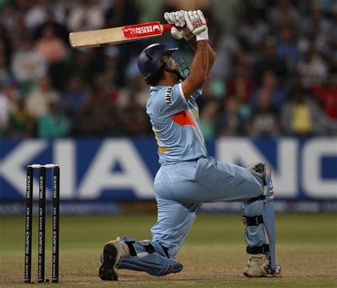 Yuvraj Singh slashes the fourth of his six sixes in an over ...