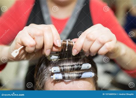 Perm in the beauty salon stock photo. Image of closeup - 107688954