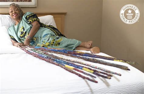 Woman with 42-feet-long fingernails scores world record