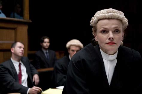 Why do british lawyers and judges wear wigs? - LogicGoat