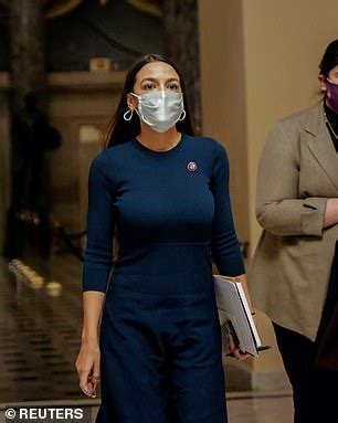 AOC says she's going to keep wearing a face mask despite being fully ...