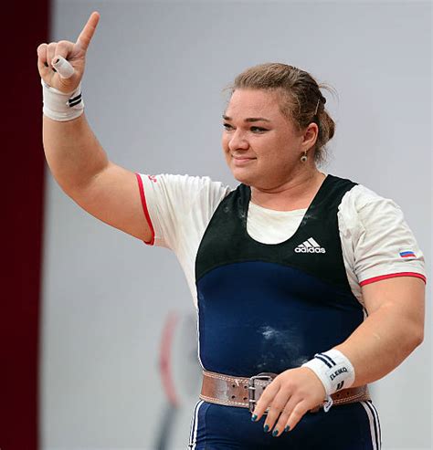 Tatiana Kashirina of Russia reacts after she established new world ...