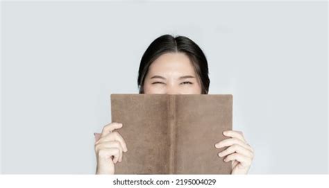 10,581 Woman With Book Covering Face Images, Stock Photos & Vectors ...