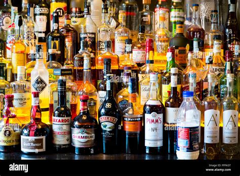 Hard alcohol bottles in a bar Stock Photo - Alamy