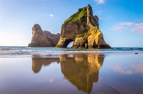 Rock Formations On Wharariki Beach New Zealand Stock Photo - Download ...