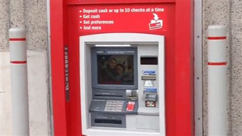 Worker becomes stuck behind a Bank of America ATM in Corpus Christi, Texas