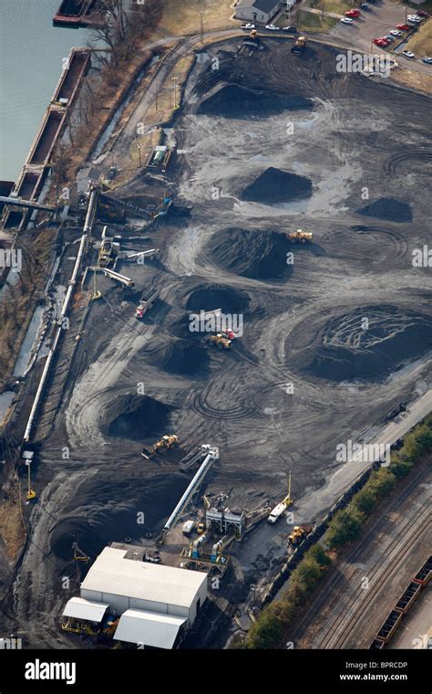 Aerial view of a coal barge loading facility Stock Photo - Alamy