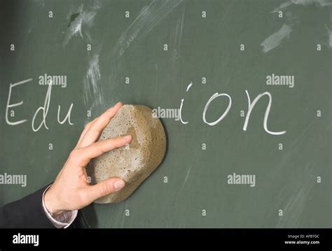 Erasing blackboard instructor hi-res stock photography and images - Alamy