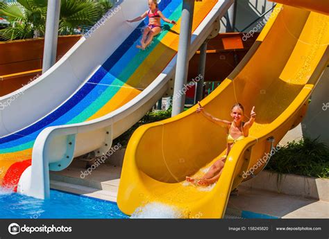 Swimming pool slides for children on water slide at aquapark. — Stock ...