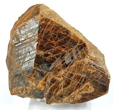 Monazite: A rare-earth phosphate mineral.