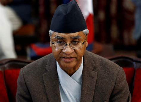 Nepal's new PM faces race for coronavirus vaccinations | Reuters