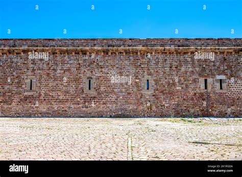 Montjuic Castle. Medieval stone wall architecture inside of the former ...