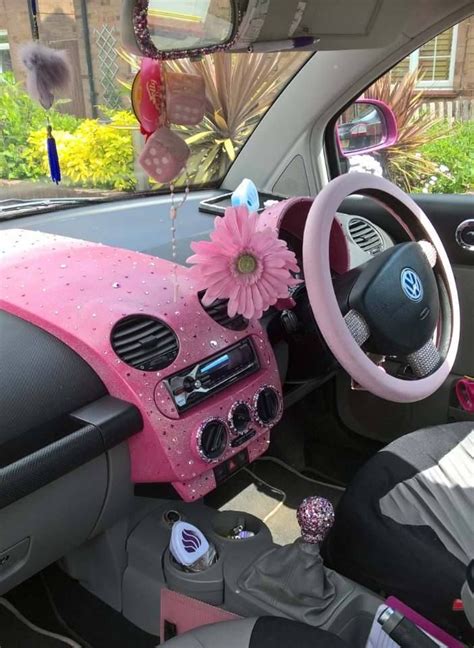 Interior of Pink Volkswagen Beetle with Pink Flower Decor