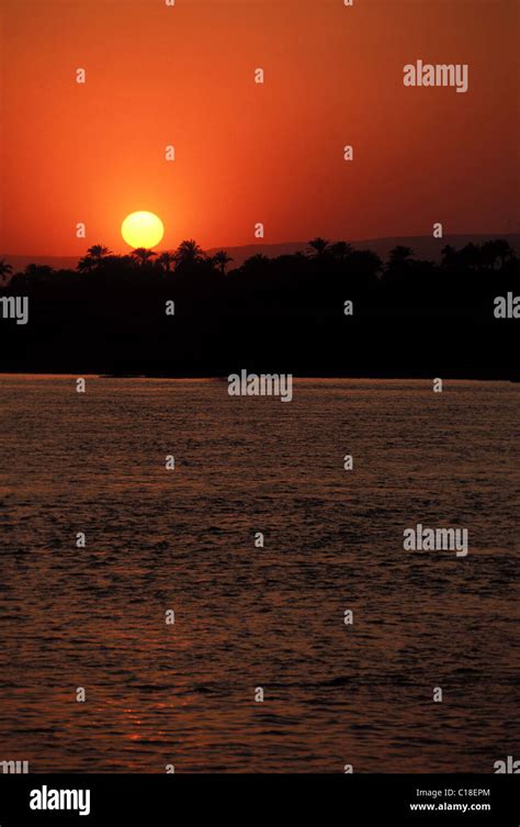 Egypt, Nile valley, sunset over the Nile river Stock Photo - Alamy