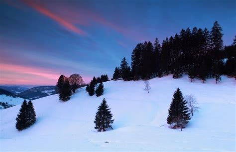 Premium Photo | Dramatic sunrise over snowy mountains