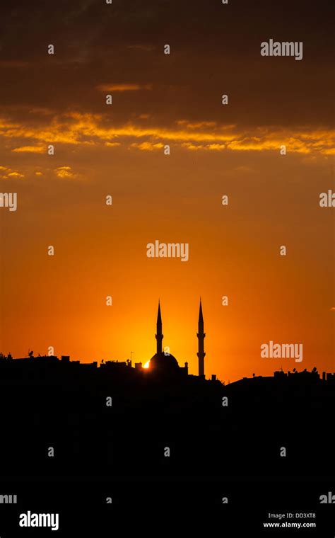 mosque with sunset silhouette Stock Photo - Alamy