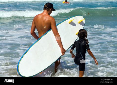 Young girl getting surfing lessons at Surf camp at Del Mar Beach in San ...