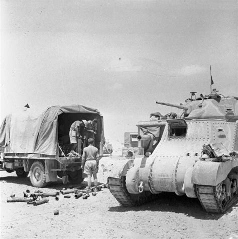 A Grant tank crew loading up with ammunition from a truck, 18 June 1942 ...