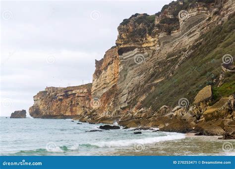 The Cliff in Nazare, Where the Most Famous Lighthouse in the World is ...