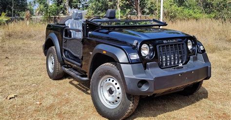 Mahindra Thar 4X4 SUV modified as an open-top Willys jeep