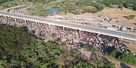 Thousands of Immigrants Packed Under TX Bridge as Biden's Border Crisis ...