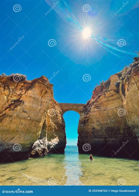 Praia Dona Ana. Beach with Caves and Bridge on Cliffs in Lagos, Stock ...