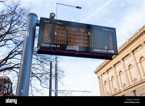 street sign at the bus stop with bus timetable Stock Photo - Alamy