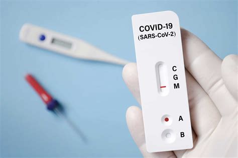 Positive test result by using rapid test for COVID-19, quick fast ...