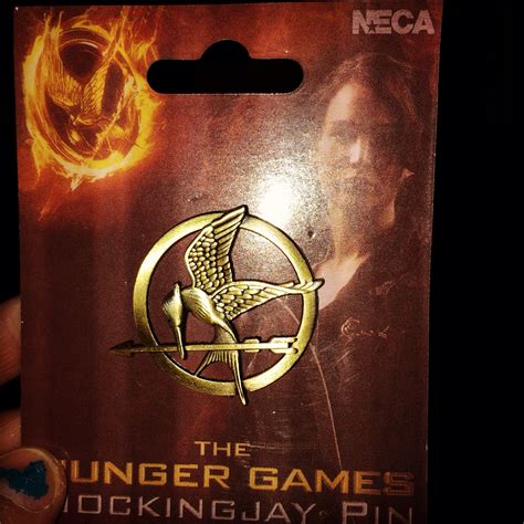 Hunger games mockingjay pin