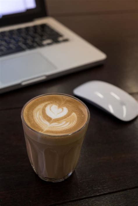 coffee latte art in coffee shop 11044317 Stock Photo at Vecteezy