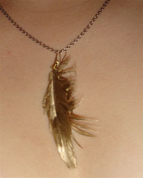 The Golden Feather Necklace · How To Make A Feather Necklace · Jewelry ...