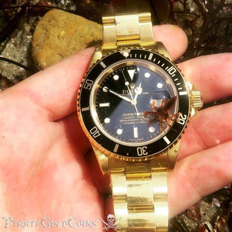 Gold Rolex Submariner w/ Black Face - Pirate Gold Coins