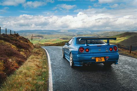 Nissan Skyline R34 HD Wallpaper - Majestic Roadside Views