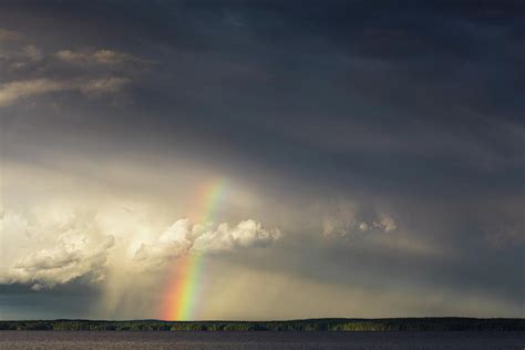 Rainbow and storm clouds Photograph by Juhani Viitanen - Fine Art America