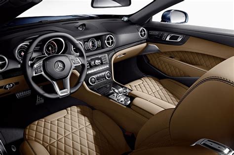 the interior of a sports car with red leather and chrome trims is shown ...