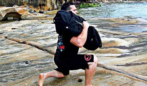 Beginner's Guide to Sandbag Training - Onnit Academy | Sandbag training ...