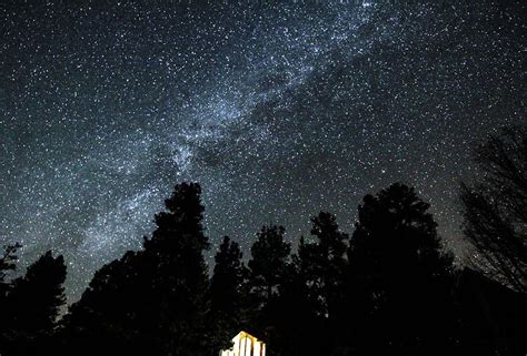 Dark Night Sky Over Cabin Photograph by Caroline Haldeman - Pixels