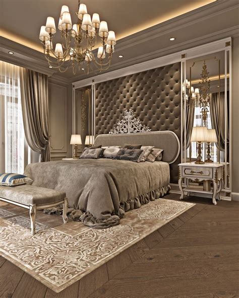 a large bed sitting in the middle of a bedroom next to a chandelier