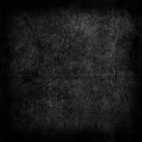 Free Photo | Dark grunge texture background with scratches and stains