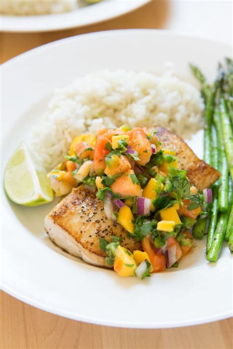 Pan Seared Mahi Mahi with Mango Papaya Salsa. The Mahi Mahi is cooked ...