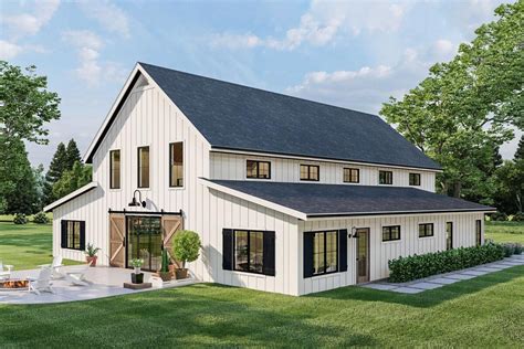 Barndominium-style House Plan with Home Office and Two-story Great Room ...