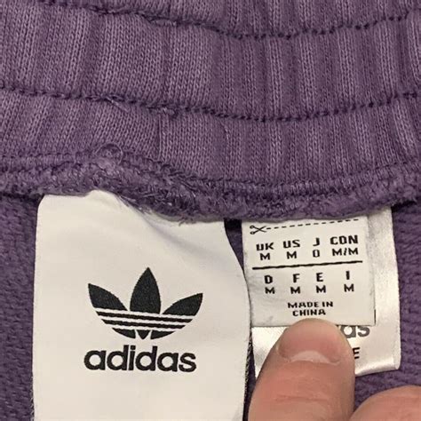 Adidas Human Race Purple Sample Rare Sweatshorts... - Depop