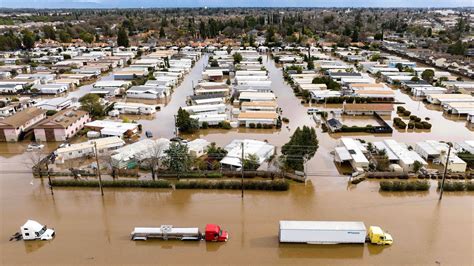 California Storm Floods Streets, Commuter Station Amid Persistent Rain