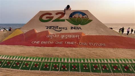 India's G20 presidency logo is created on sand by noted artist Sudarsan ...