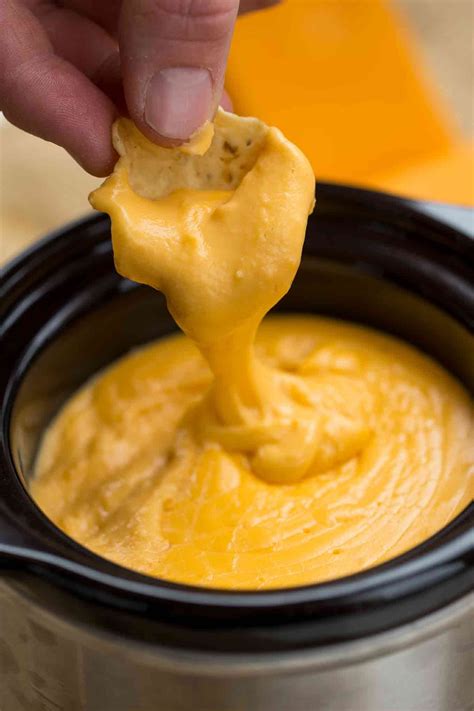 The easiest slow cooker nacho cheese sauce ever! AND no processed ...