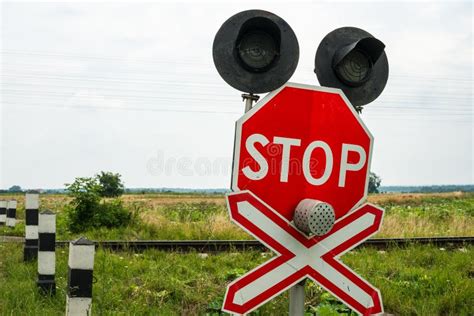 Traffic Lights And Signs At The Railroad Crossing Stock Photo - Image ...