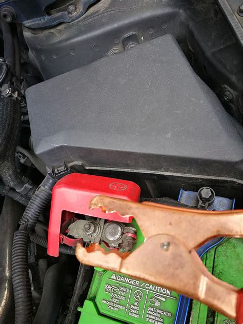 How to charge a car battery with jumper cables