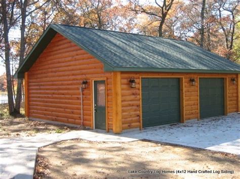 Handcrafted Log Garage | Cowboy Log Homes | Vinyl log siding, Log ...