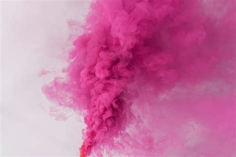 Free Photo | Pink smoke effect on a white wallpaper